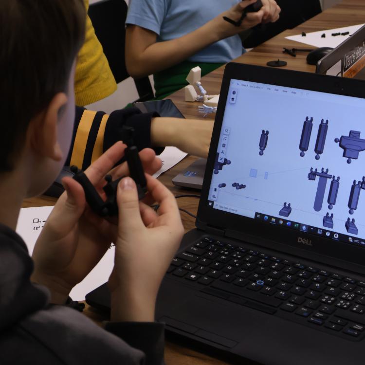 Child working on a digital project